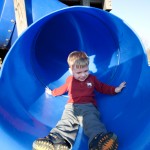 Ethan coming down a blue slide